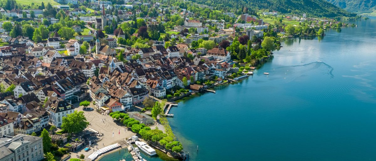 Aerial view of Zug: the old town and Landsgemeindeplatz on the shore of Lake Zug.